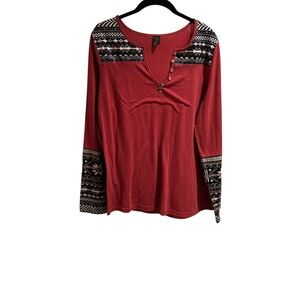 Elegant Red Long Sleeve Top with Patterned Accents